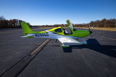 Lime green and white Cirrus SR-series aircraft detail, image N294GG-019.