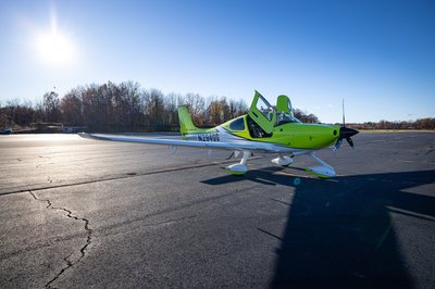 Lime green and white Cirrus SR-series aircraft detail, image N294GG-022.