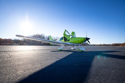 Lime green and white Cirrus SR-series aircraft detail, image N294GG-024.