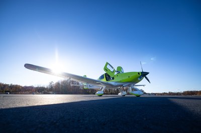 Lime green and white Cirrus SR-series aircraft detail, image N294GG-025.