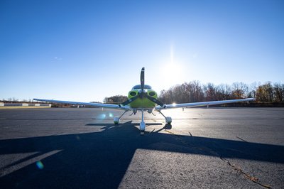 Lime green and white Cirrus SR-series aircraft detail, image N294GG-028.