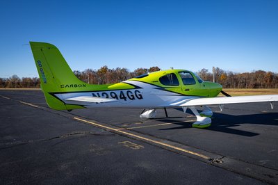 Lime green and white Cirrus SR-series aircraft detail, image N294GG-041.