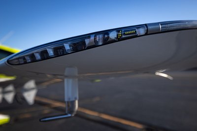 Lime green and white Cirrus SR-series aircraft detail, image N294GG-051.