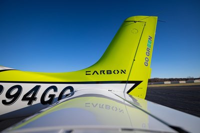 Lime green and white Cirrus SR-series aircraft detail, image N294GG-053.