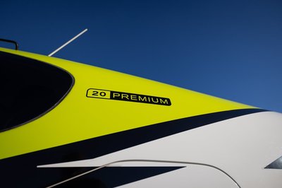 Lime green and white Cirrus SR-series aircraft detail, image N294GG-055.