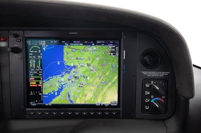 Lime green and white Cirrus SR-series aircraft detail, image N294GG-080.